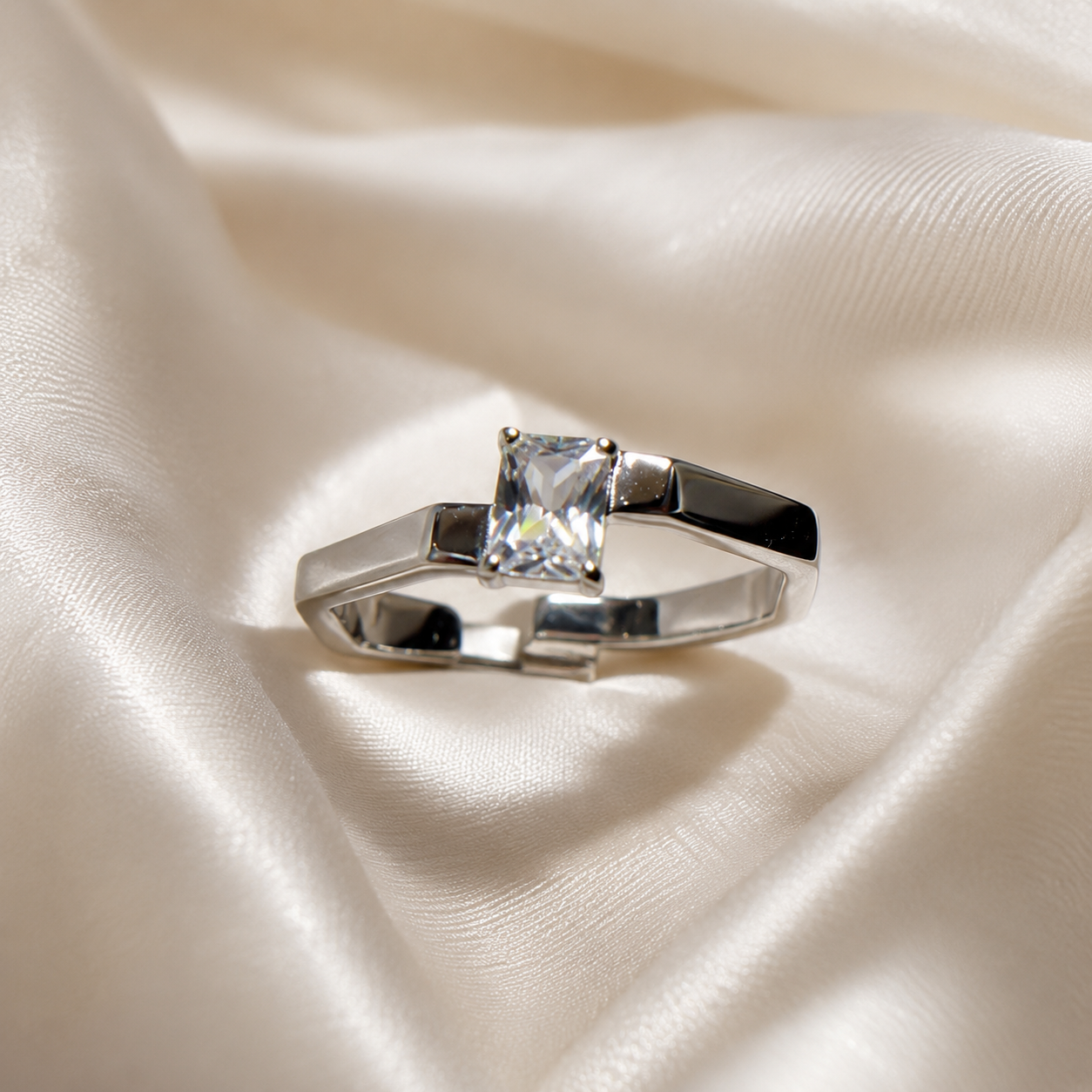 Radiant-Cut Solitaire Crossover Ring
